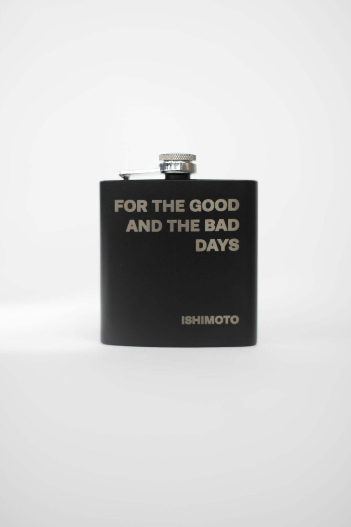 Black flask engraved with "FOR THE GOOD AND THE BAD DAYS"