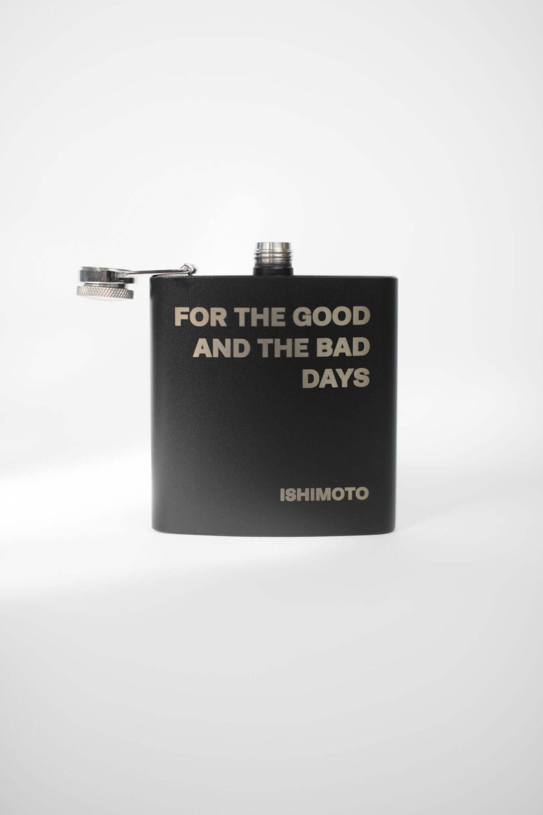 Black flask engraved with "FOR THE GOOD AND THE BAD DAYS"