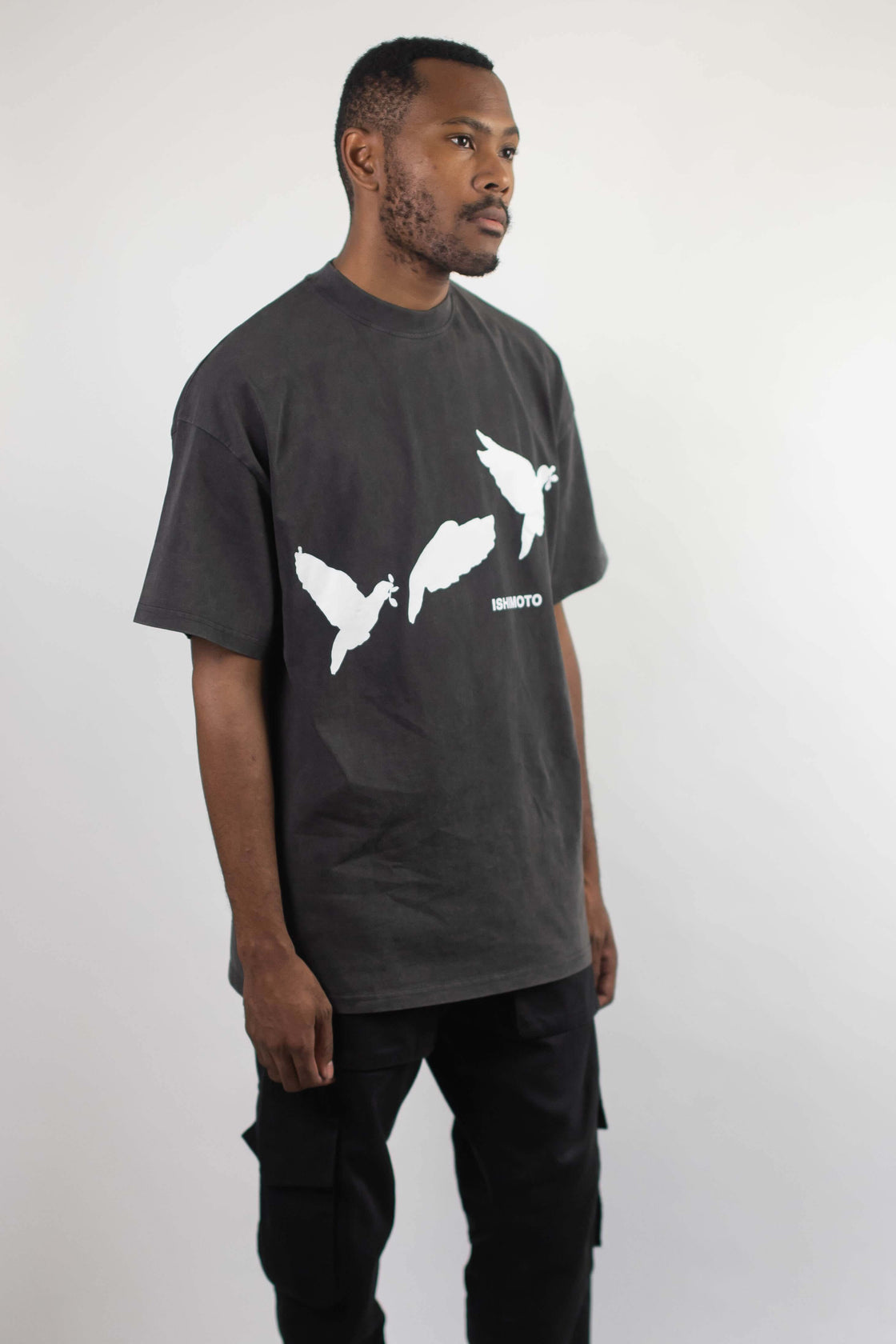 Charcoal t-shirt that has three doves flying away with text ISHIMOTO written underneath